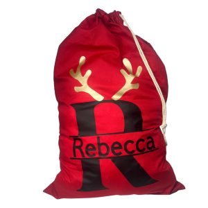 Personalised red Christmas sack with black letter R, gold reindeer antlers, and the name Rebecca printed on the front.